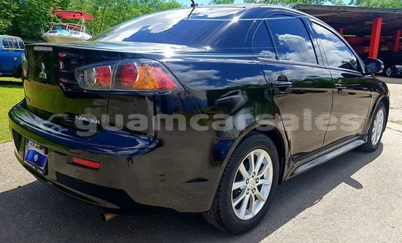 Buy Import Mitsubishi Lancer Black Car in Dededo in Dededo Buy Import Mitsubishi Lancer Black Car in Dededo in Dededo
