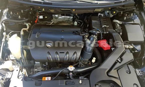 Buy Import Mitsubishi Lancer Black Car in Dededo in Dededo Buy Import Mitsubishi Lancer Black Car in Dededo in Dededo
